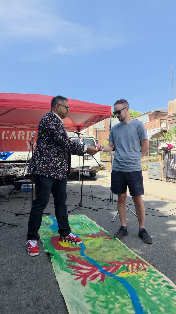 Magician performing a close-up card trick for a guest