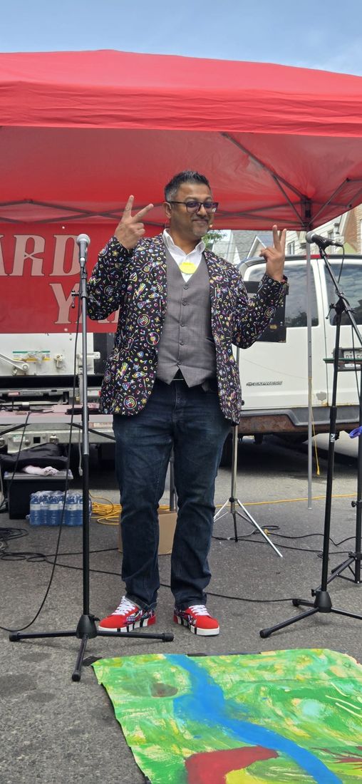 Performer commanding a stage at a public event